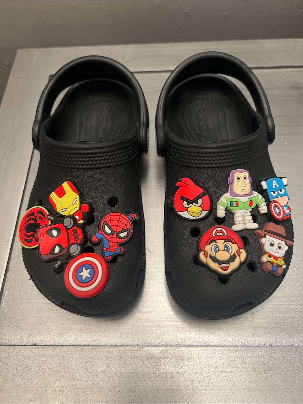 Crocs Classic Clog, toddler size 9c. Black with charms
